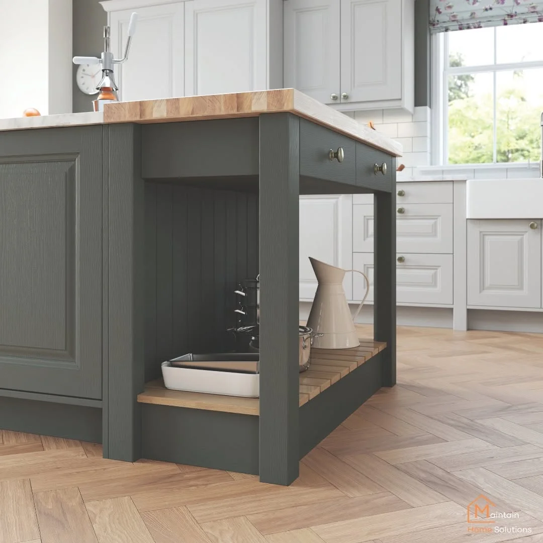 Green shaker kitchen island with open shelving and wood-effect Karndean luxury vinyl tile flooring
